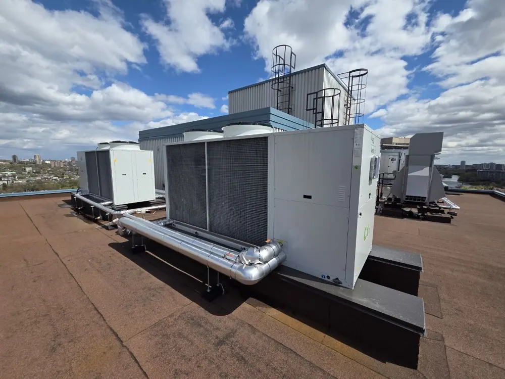 Arrow mechanical site photo — Rooftop condensing units
